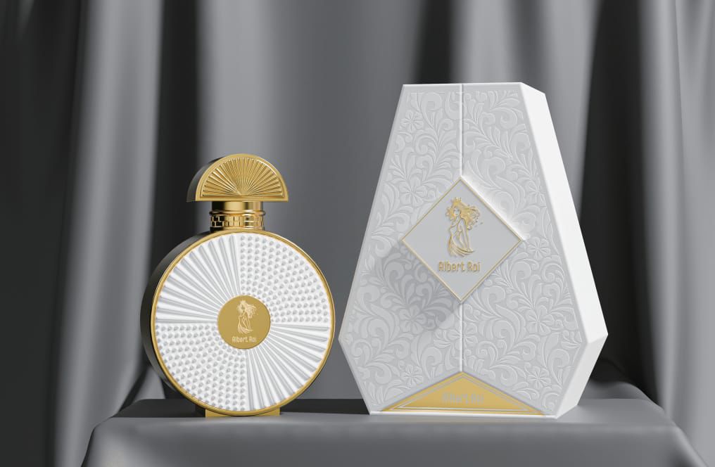 Albert Roi feminine perfume — white and gold luxury fragrance bottle with flowing-hair queen emblem